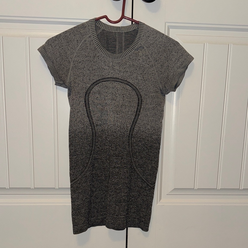 Swiftly tech short sleeve hip length size 4